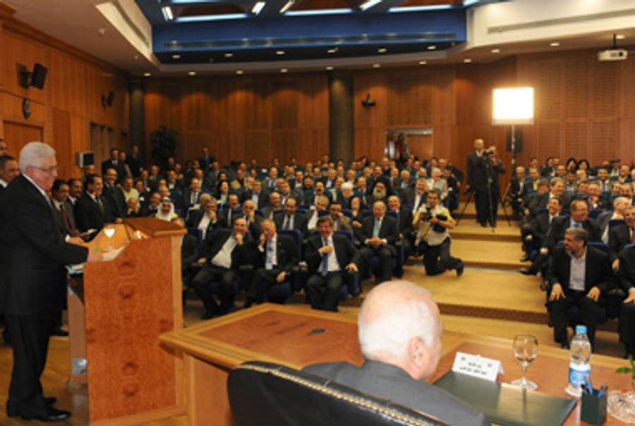 P.A. President Abbas speaks at yesterday’s ceremony. Where are all the ladies?(Thaer Ganaim/PPO via Getty Images)