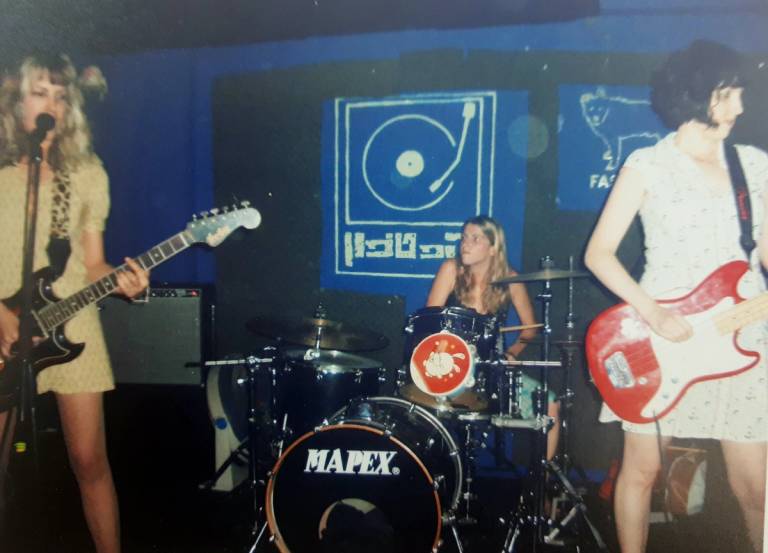 Las Michelles perform at the Patiphone, circa 2003. The author is on the right, playing bass guitar. 