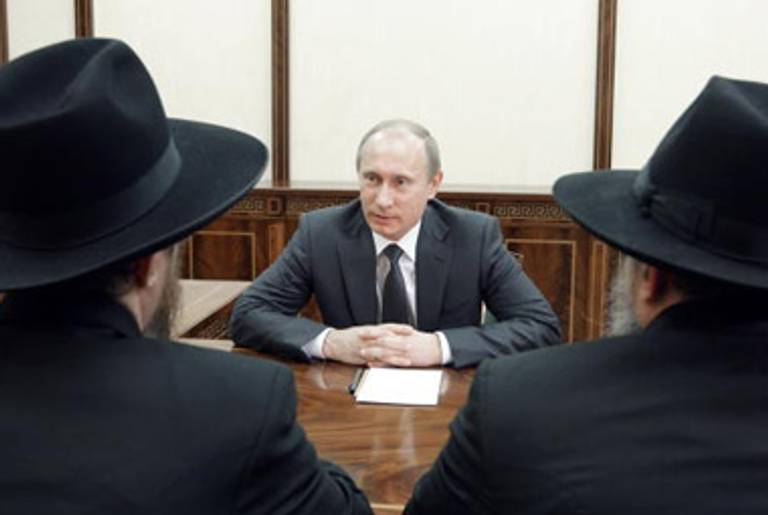 Russian Prime Minister Putin meets with two Russian Rabbis (Lazar on left) earlier this year.(Lexey Druzhinin/AFP/Getty Images)