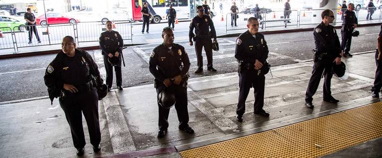 Los Angeles Airport police guard a protest against the executive order by US President Donald Trump, banning immigrants from seven majority-Muslim countries at Los Angeles International Airport in Los Angeles, California, February 4, 2017. 