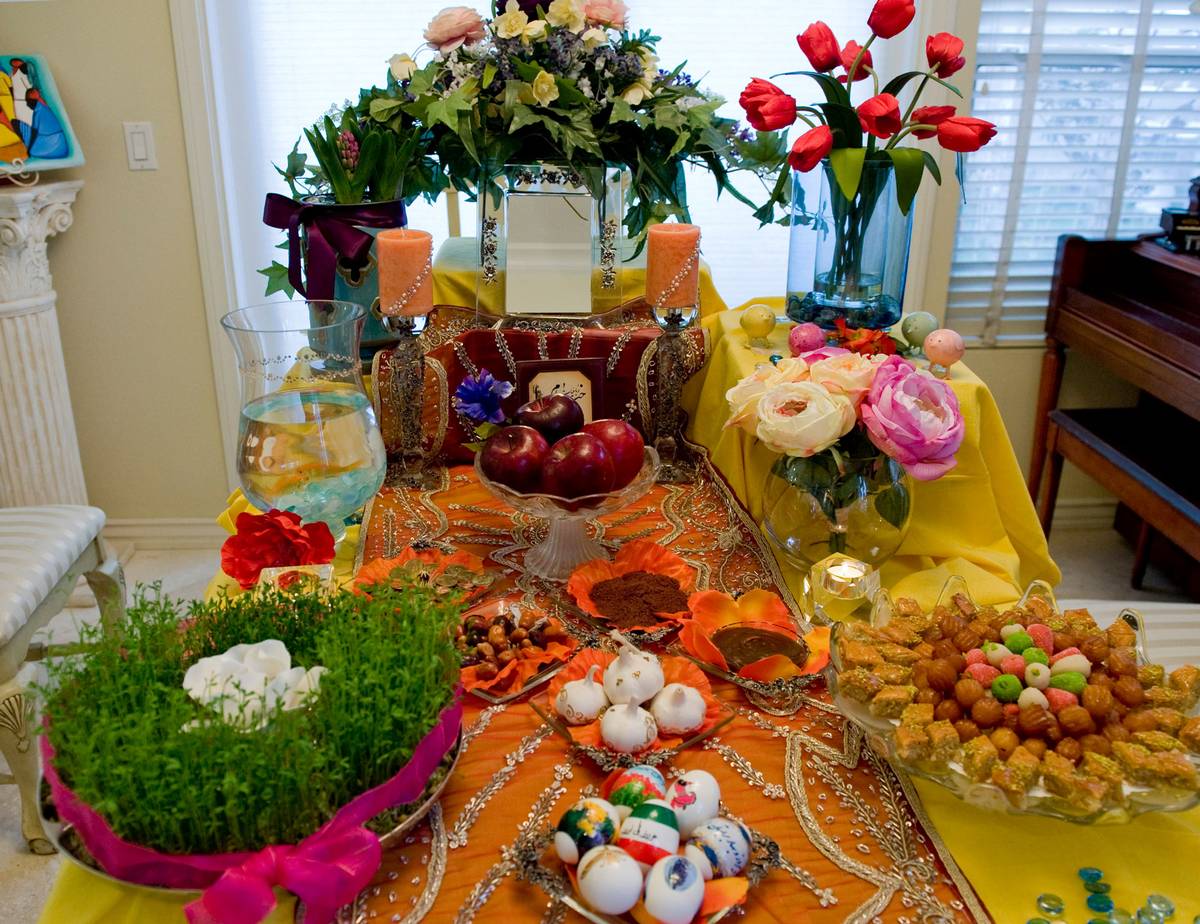 The ‘haft seen,’ or traditional table setting for Nowruz, is set up in the home of a family in Irvine, California. The table includes seven items all starting with the letter ‘S,’ or ‘seen’ in the Persian alphabet.