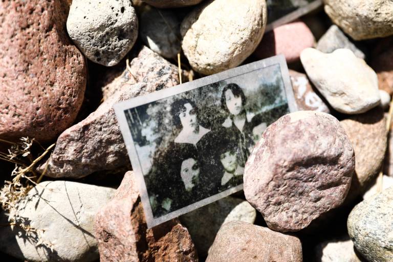 An archive photograph is seen on July 29, 2021, near the memorial commemorating the pogrom in Jedwabne, Poland. During World War II hundreds of Jews were murdered in this place by their Polish neighbors in German-occupied Poland.