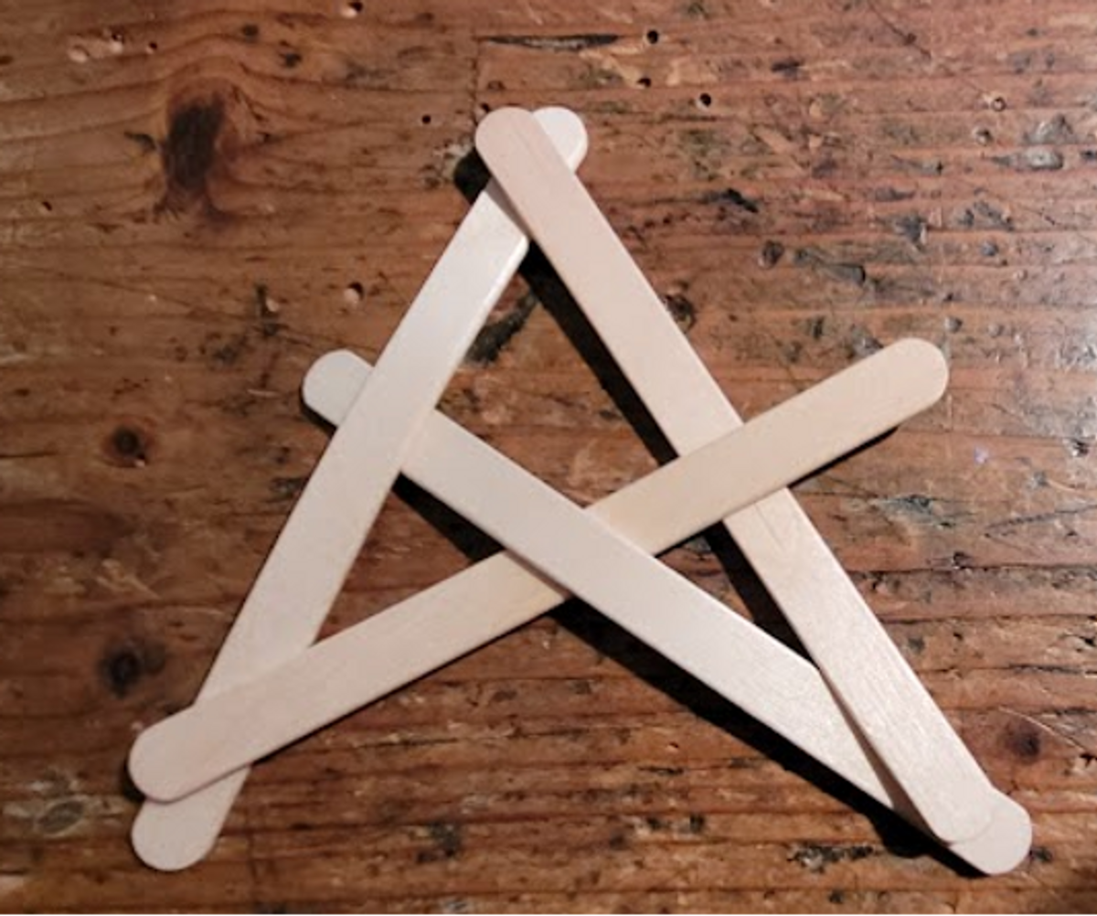 Figure 2: A popsicle stick bomb. It is kept together by its networked structure. Separate one of the sticks from the others and it 'explodes.'