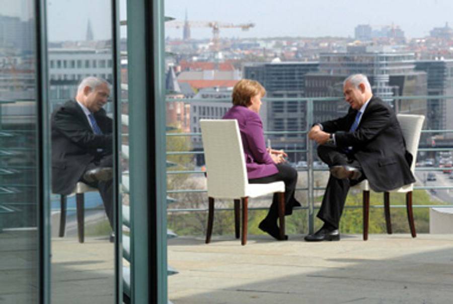 Merkel and Netanyahu in Berlin today.(Avi Ohayon/GPO via Getty Images)
