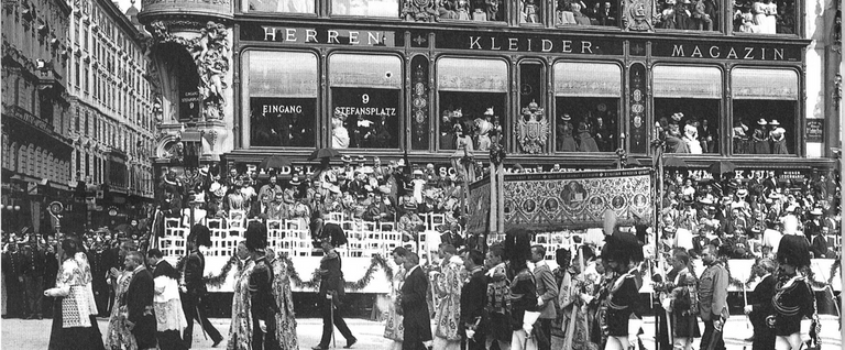 Franz Joseph I of Austria marches by a a Jacob Rothberger department store, December 31, 1897.