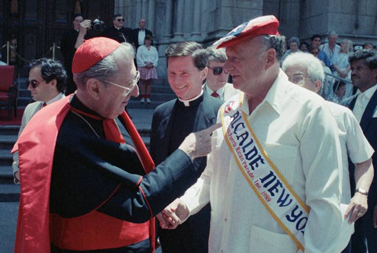 John Cardinal O'Connor and Mayor Edward Koch turn out with thousands of others for the annual Puerto Rican Day Parade down Fifth Avenue in New York, on Sunday, June 11, 1989.(Mario Cabrera/AP)