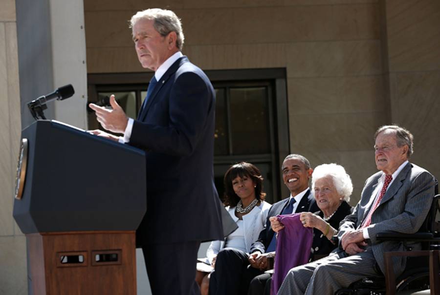 Former U.S. President George W. Bush speaks as first lady Michelle Obama, President Barack Obama, former first lady Barbara Bush, and former President George H.W. Bush listen during the opening ceremony of the George W. Bush Presidential Center April 25, 2013 in Dallas, Texas. (Alex Wong/Getty Images)