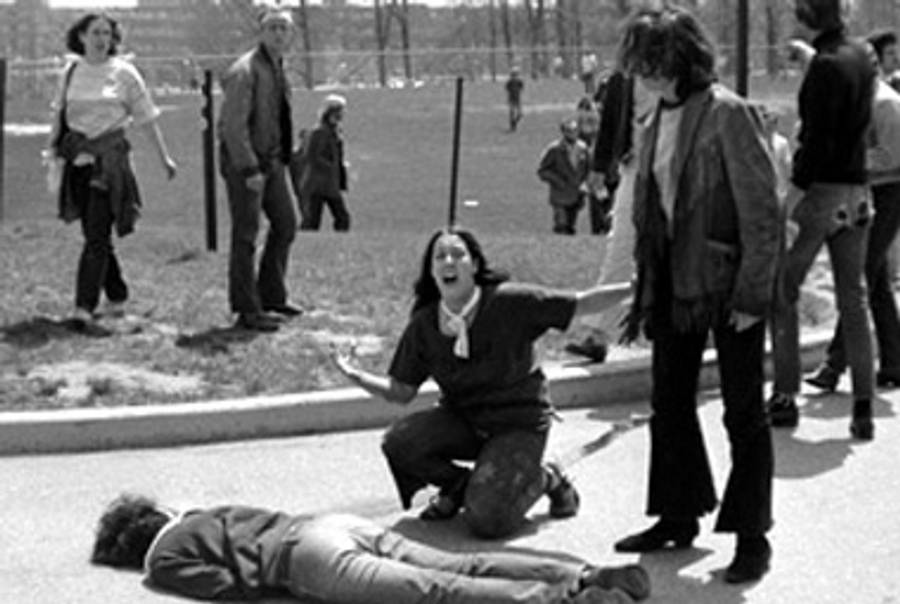 Famous photo from that day. The dead student is Jeffrey Miller, who was Jewish.(Forward)