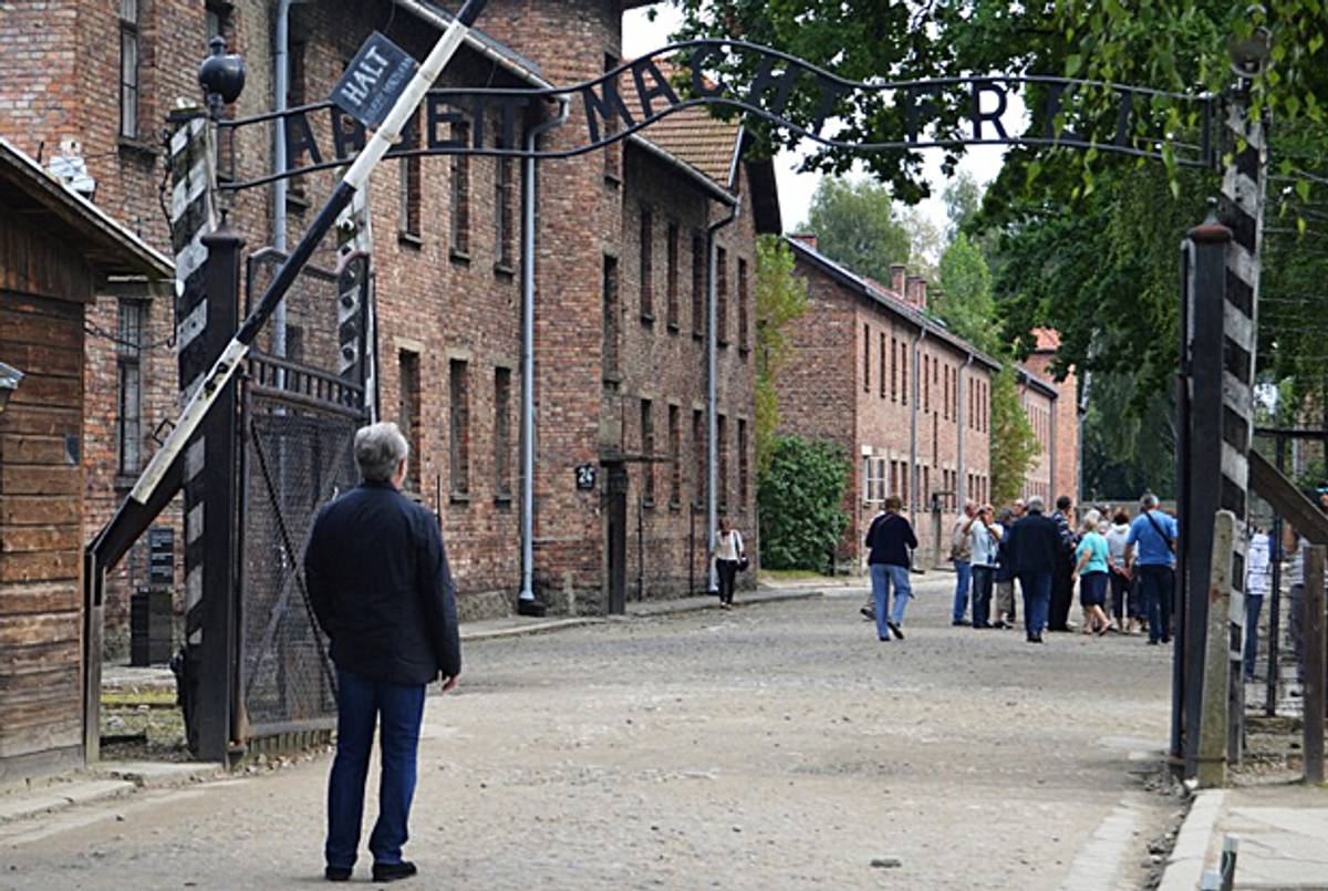 Wolf Blitzer at the gates of the Auschwitz concentration camp in Poland. (CNN)