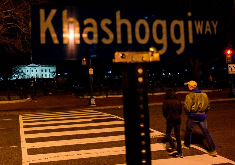 A protest sign reading ‘Khashoggi way’ is seen across the street from the White House in Washington, D.C., on Dec. 23, 2018