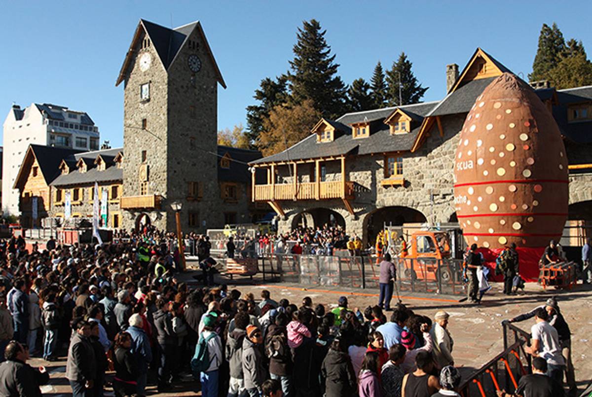 People gather at the Civic Centre of Bariloche, Argentina, on April 8, 2012, to look and have a taste of the town's 8.5-meter-high Easter egg, certified by the Guinness Records as the world's largest.(Francisco Ramos Mejia/AFP/Getty Images)