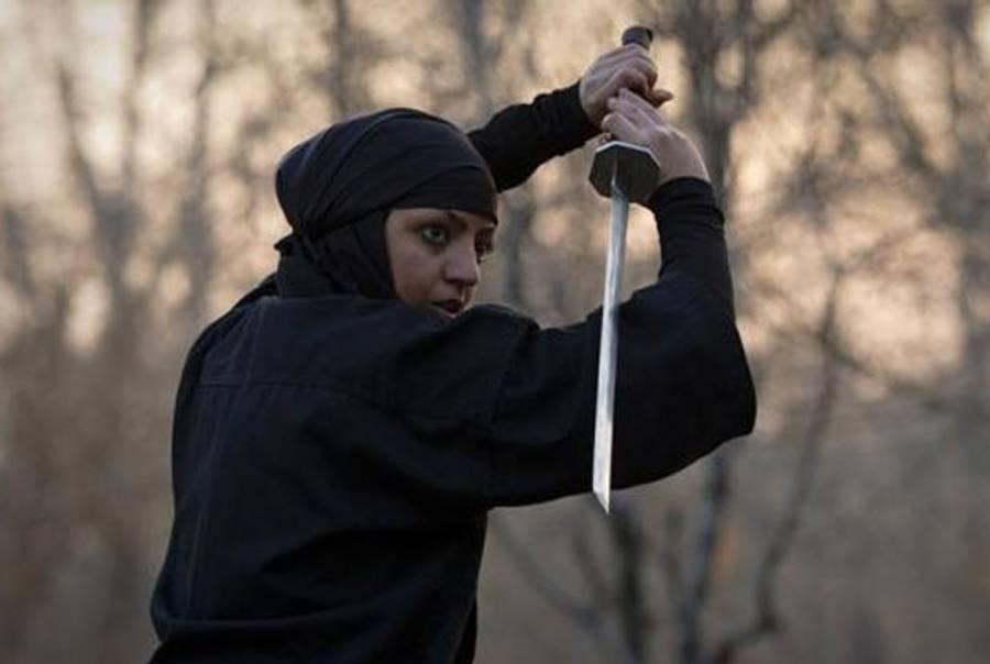 An Iranian ninja plans her next move(REUTERS/Caren Firouz)