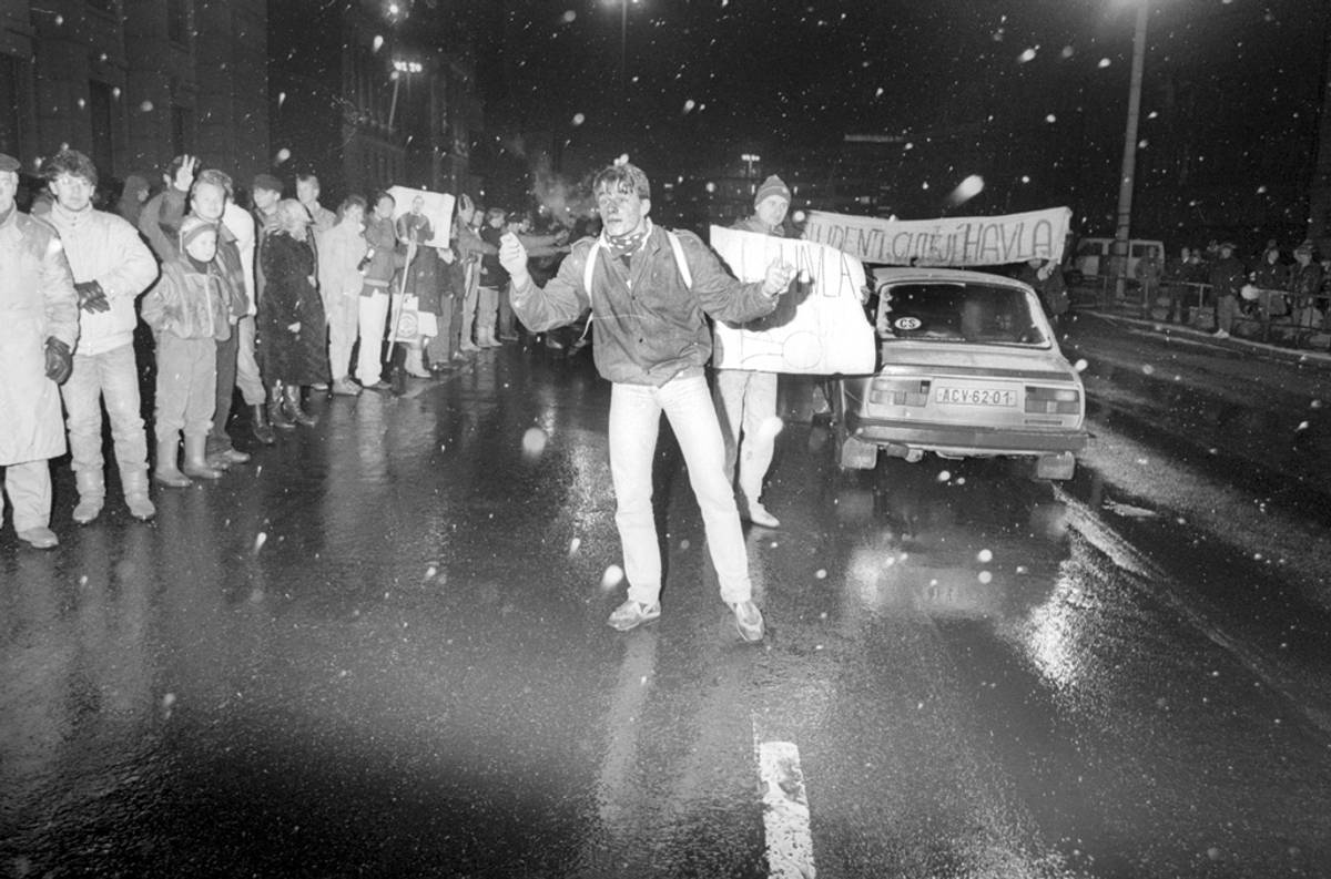 Students stopping cars on the highway out of Prague, November 1989