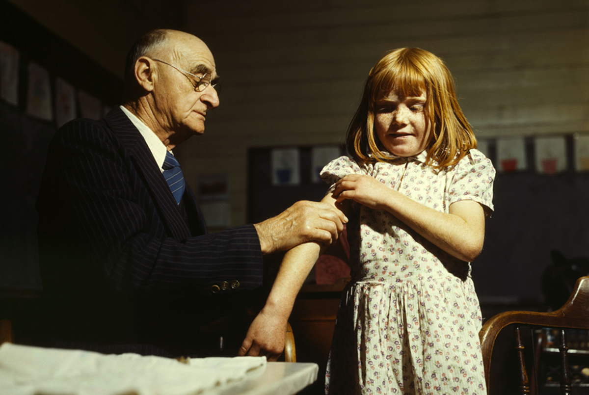 Dr. Schreiber giving a typhoid innoculation at a rural school, San Augustine County, Texas.(Library of Congress )