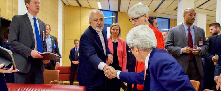 Secretary of State John Kerry shakes hands with Iranian Foreign Minister Javad Zarif in Vienna, Austria, on July 14, 2015. 