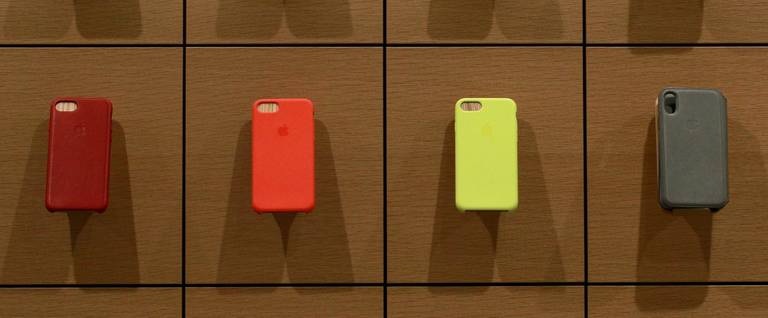 Apple iPhone cases on display at an Apple store in Chicago, March 27, 2018.