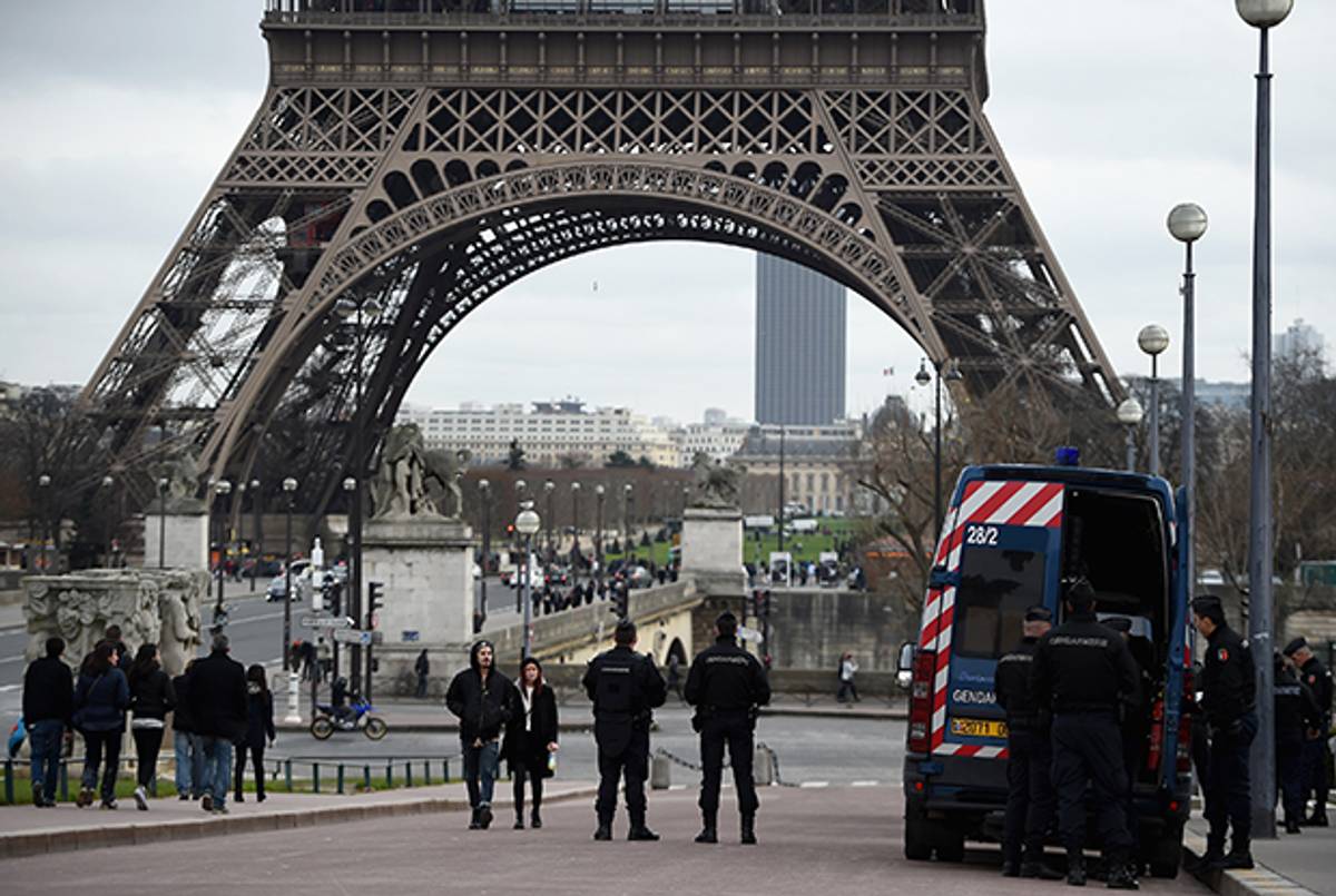 French troops patrol around the Eiffel Tower on January 12, 2015 in Paris, France. (Jeff J Mitchell/Getty Images)