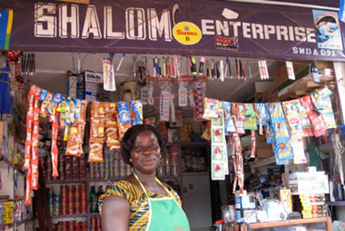 The shopkeeper stands in front of a prosperous Jewish shop in New Adiembra, Sefwi Wiawso district, where many Ghanaian Jews work.(Anna Boiko-Weyrauch)