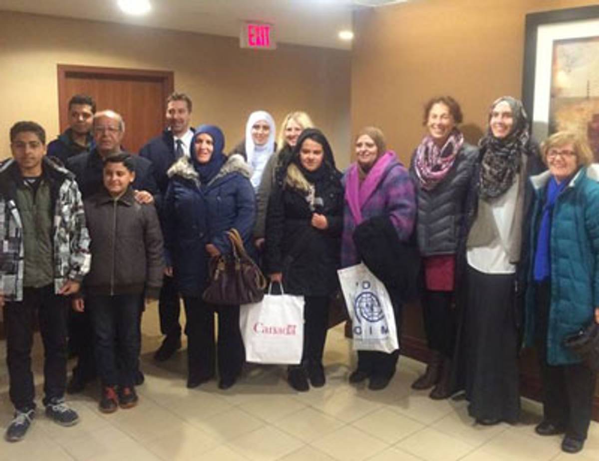 The Al-Balkhi family is welcomed at the airport. Rabbi Stephen Wise is fifth from the left. (Photo: Shirley Smurlick)