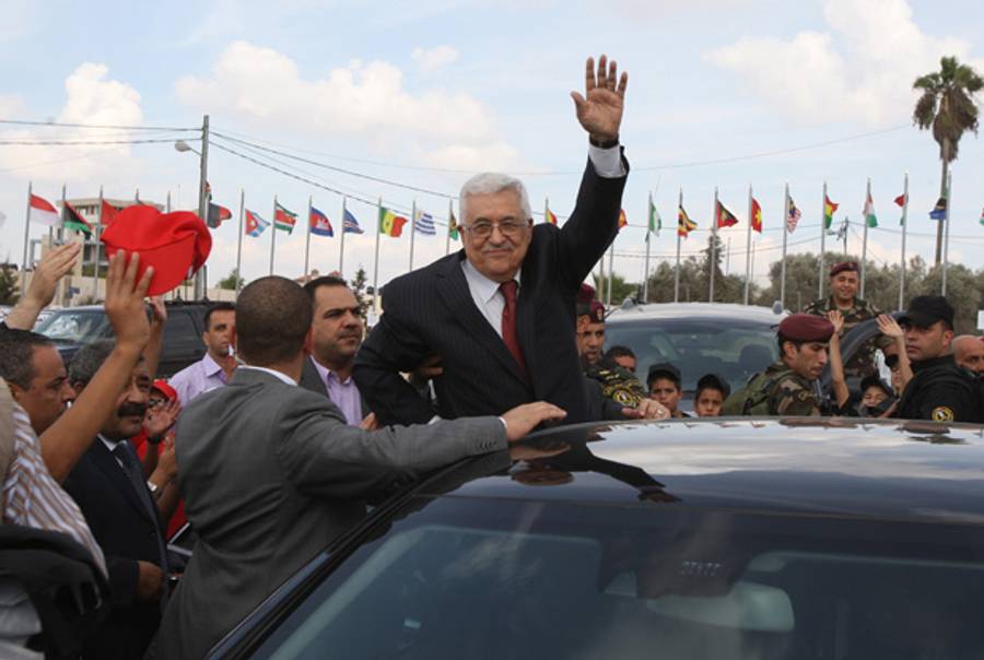 President Abbas this weekend, in the first photograph in which he has ever looked happy.(Abbas Momani/AFP/Getty Images)
