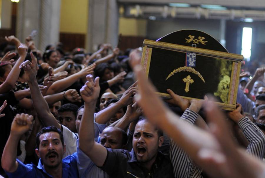 The funeral on Thursday of a Coptic Egyptian killed in the clashes.(Mohammed Hossam/AFP/Getty Images)