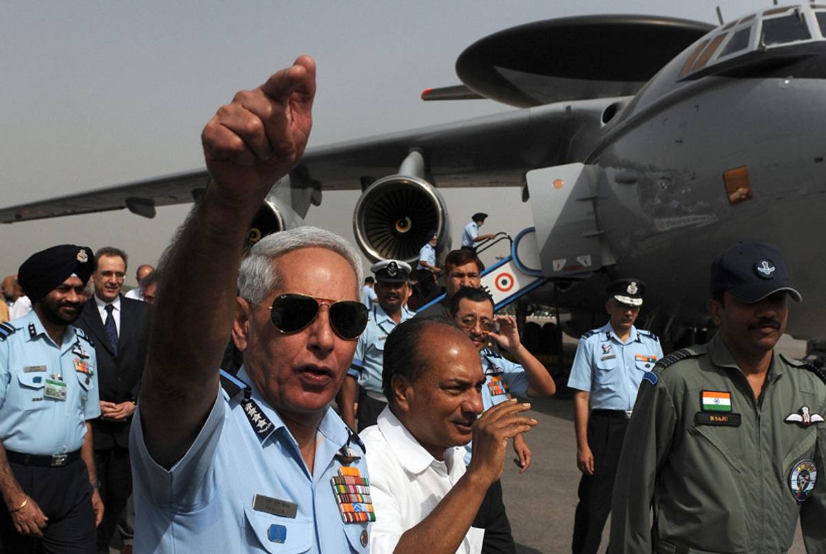 Indian Air Force Chief F.H. Major (left) and Indian Defense Minister A. K. Antony (center) inspect the Airborne Warning and Control System airplane at an Air Force station in New Delhi on May 28, 2009.(Prakash Singh/AFP/Getty Images)