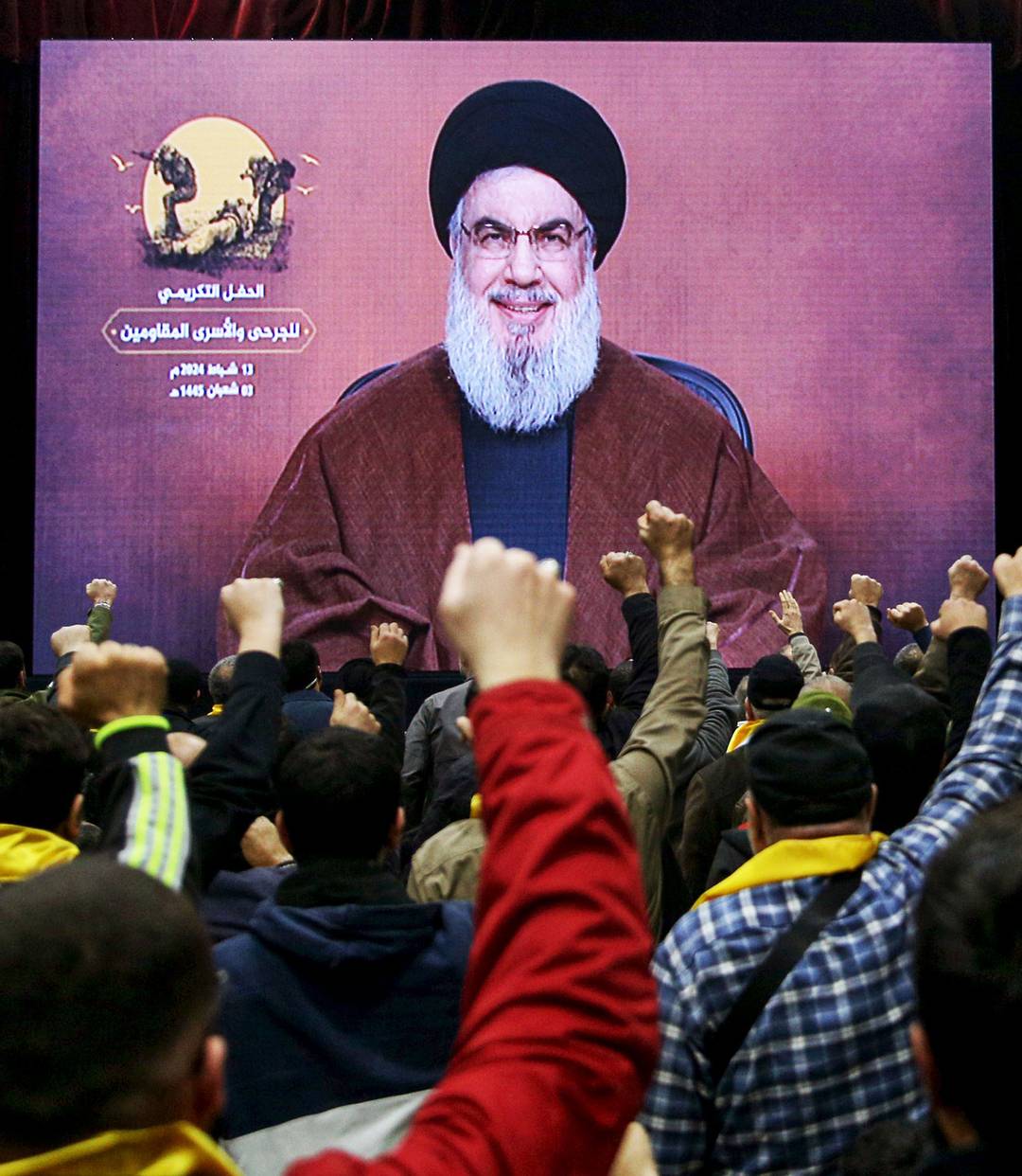 Supporters of the Iranian-backed Hezbollah group cheer as they listen to a speech by Hassan Nasrallah, secretary-general of Hezbollah, Feb. 13, 2024