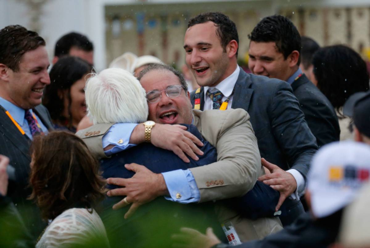  Ahmed Zayat hugs Bob Baffert after American Pharoah won the Preakness Stakes, May 16, 2015. (Rob Carr/Getty Images)