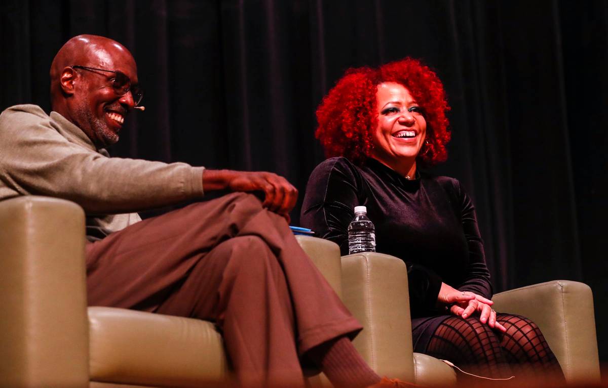 Nikole Hannah-Jones with Ray Dial, the Black studies teacher who first introduced her to the significance of the year 1619, during their conversation at West High School, Nov. 23, 2021