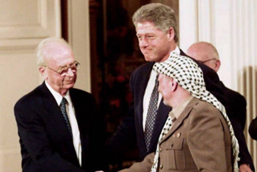 Rabin, Clinton, and Arafat in 1995.(J. David Ake/AFP/Getty Images)