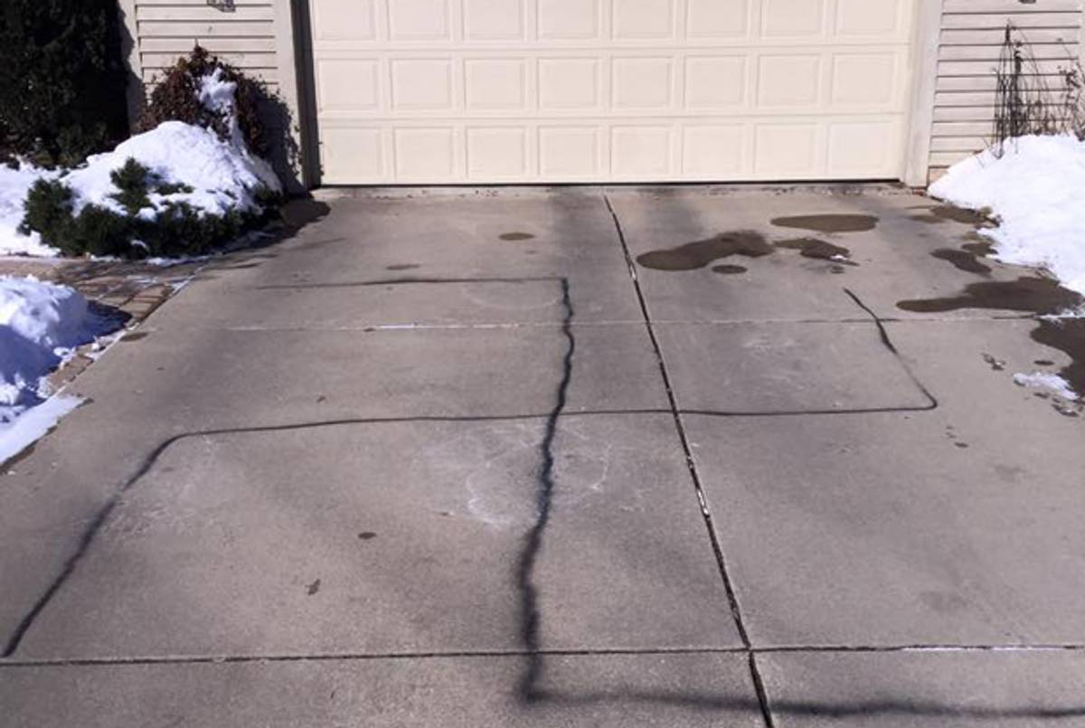 Swastika spray painted on a driveway in Madison, WI. (Photo courtesy of James Stein)