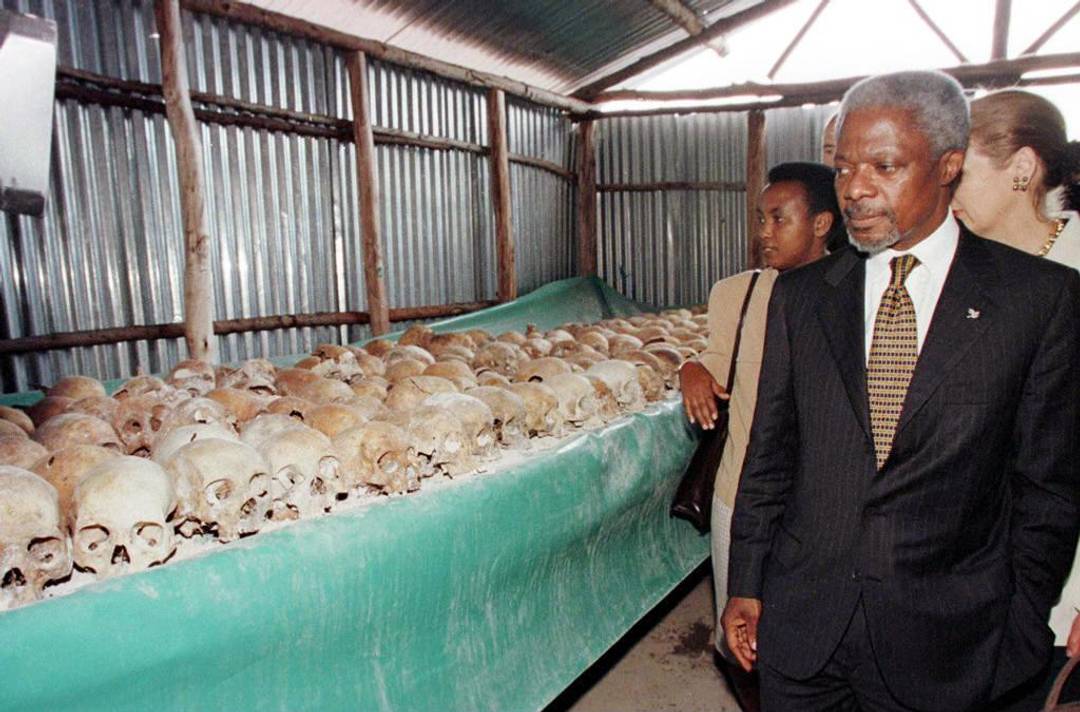 Then-U.N. Secretary General Kofi Annan walks by skulls at the Mwulire Genocide Memorial in Rwanda, May 8, 1998