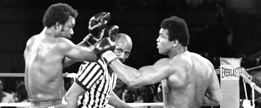 Muhammad Ali (R) fights George Foreman in Kinshasa, Zaire, in a bout dubbed 'The Rumble in the Jungle,' September 30 1974. 