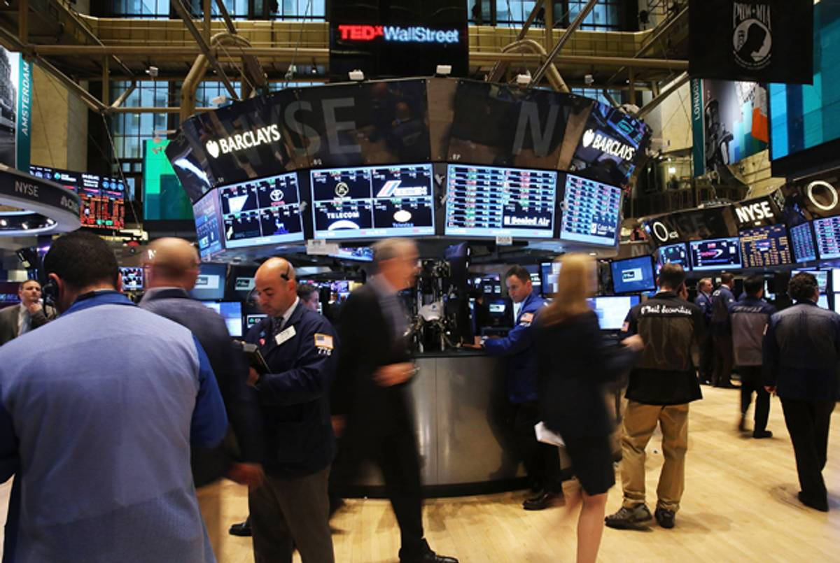 Traders work on the floor of the New York Stock Exchange at the end of the trading day on October 30, 2013 in New York City.(Spencer Platt/Getty Images)
