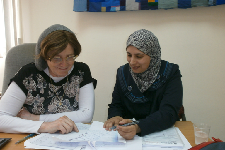 Malka Schaps researching crystal graphs with her Ph.D. student Ola Omari, a teacher at Al-Qasemi Academy.(Israel Berger)