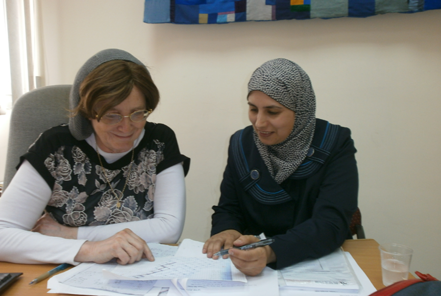 Malka Schaps researching crystal graphs with her Ph.D. student Ola Omari, a teacher at Al-Qasemi Academy.(Israel Berger)