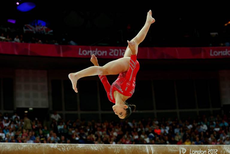 Alexandra Raisman of the United States competes in the in the Artistic Gymnastics Women's Team final on Day 4 of the London 2012 Olympic Games at North Greenwich Arena on July 31, 2012 in London, England.(Ronald Martinez/Getty Images)
