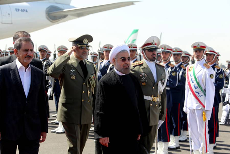 Iranian president Hassan Rouhani arrives at Tehran's Mehrabad Airport, on September 28, 2013. (ATTA KENARE/AFP/Getty Images)