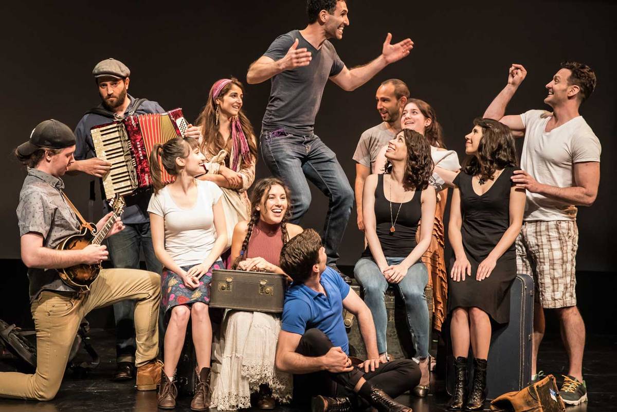 Stephanie (seated, 4th from right) with the cast of ‘Amerike.’ (Photo: Lou Montesano)
