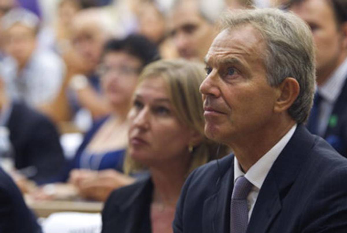 Quartet envoy Tony Blair yesterday (with Israeli opposition leader Tzipi Livni).(Jack Guez/AFP/Getty Images)