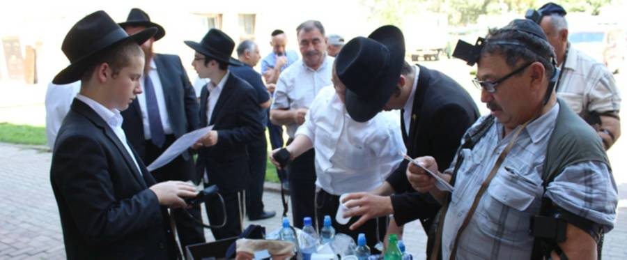 Jews from around the world pray at the 'ohel' of Rabbi Levi Yitzchak Schneerson in Almaty, Kazakhstan, in 2015.