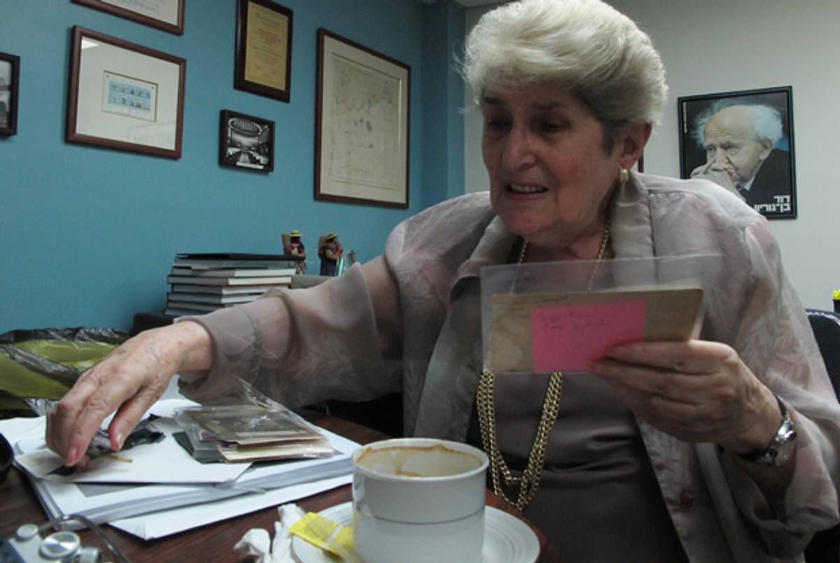 Trudy Spira, in the office of the president of the CAIV, with the galleys of her forthcoming autobiography.