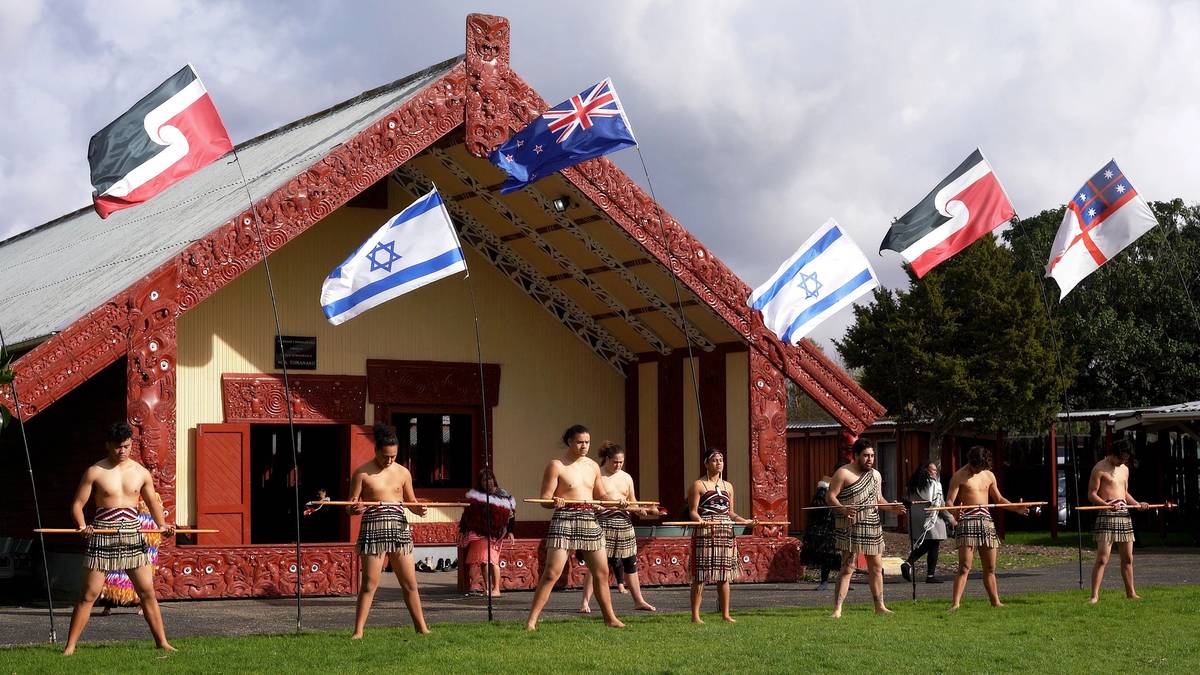 Flags of Māori, New Zealand, Israel, and the United Tribes are displayed during a ceremony of apology, called a 'whakapāha,' which was held to express regret for New Zealand’s actions in standing against Israel at the United Nations, and to seek forgiveness, 2018