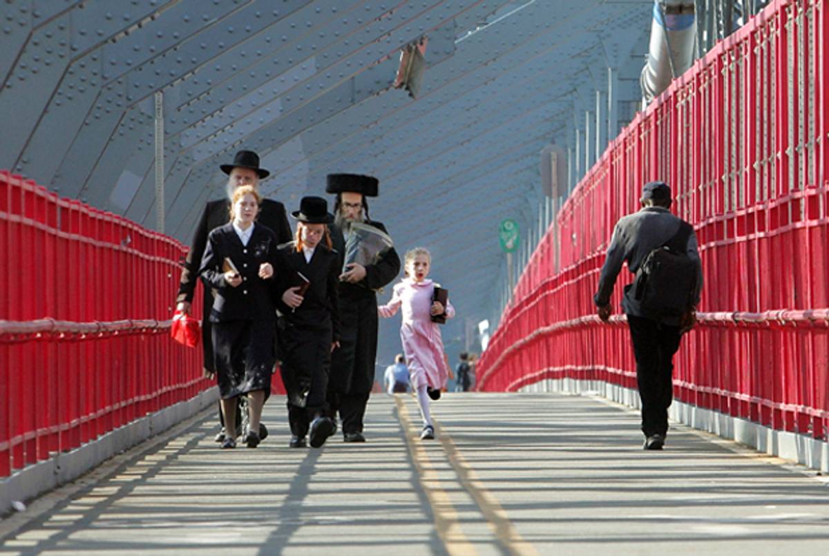  Hasidic Jews walk across the Williamsburg Bridge on Rosh Hashanah. (Mario Tama/Getty Images)