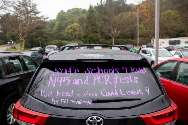 Oakland Unified teachers decorate their cars before participating in a 'sickout' demonstration on Jan. 7, 2022, saying they don't feel safe teaching and calling for extended remote learning