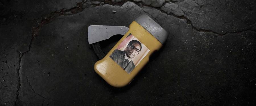 A wind-up torch handed out by the ruling Zanu PF party during their election campaign in 2013 lies on the floor of a home without any power in Bulawayo, Zimbabwe on October 15, 2015. 