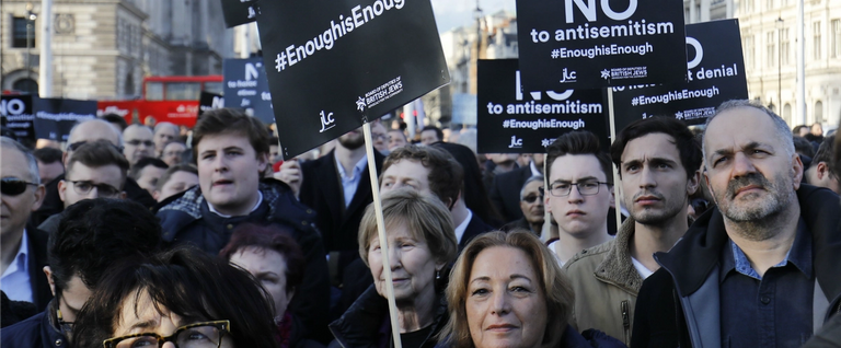 Members of the Jewish community hold a protest against Britain's opposition Labour party leader Jeremy Corbyn and anti-semitism in the Labour party, outside the British Houses of Parliament in central London on March 26, 2018.