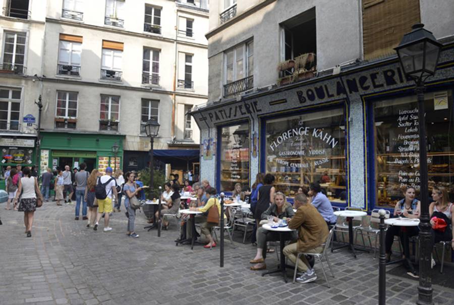People sit outside the'Florence Kahn pastries shop on July 12, 2013 in the Rue des Rosiers, the Jewish area of the Marais district in Paris(MIGUEL MEDINA/AFP/Getty Images)