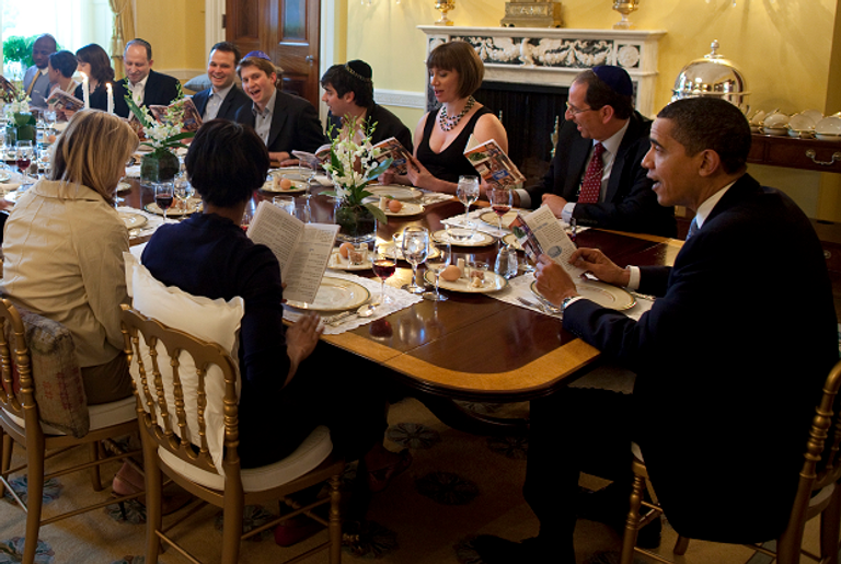 The White House Seder in April 2009. Lesser is fifth from President Obama's right. (White House / Pete Souza)
