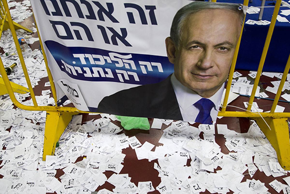 Copies of ballots papers and campaign posters for Israel's Prime Minister Benjamin Netanyahu's Likud Party in the aftermath of the March 17, 2015 election. (JACK GUEZ/AFP/Getty Images)